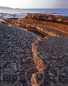 Evening at the foot of the cliffs